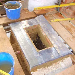 New metal-clad chimney capping prepared on site